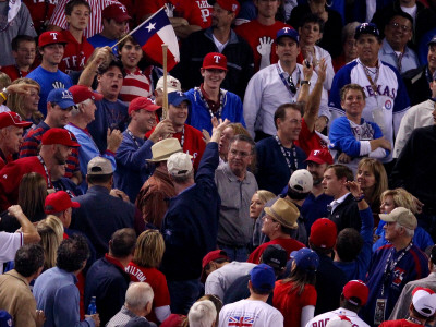 Texas Rangers V. San Francisco Giants, Game 5:  Fans React After Catching A Thrown Bat By Hamilton by Christian Petersen Pricing Limited Edition Print image