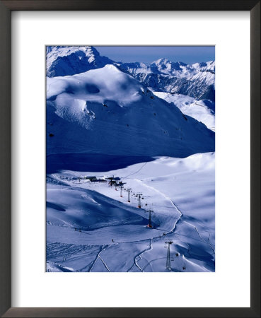 Ski Slopes And Frozen Lac Des Vaux, Verbier, Valais, Switzerland by Glenn Van Der Knijff Pricing Limited Edition Print image