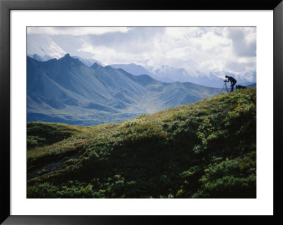 A Photographer Sets Up His Tripod To Shoot The Magnificant 20,000-Foot Mount Mckinley by Joel Sartore Pricing Limited Edition Print image