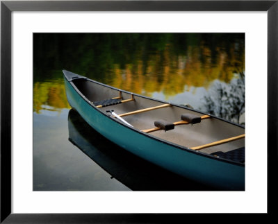 Canoe And Reflections On A Still Lake by Raymond Gehman Pricing Limited Edition Print image