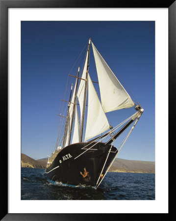 Ship Sailing Through The Galapagos Islands by Steve Winter Pricing Limited Edition Print image