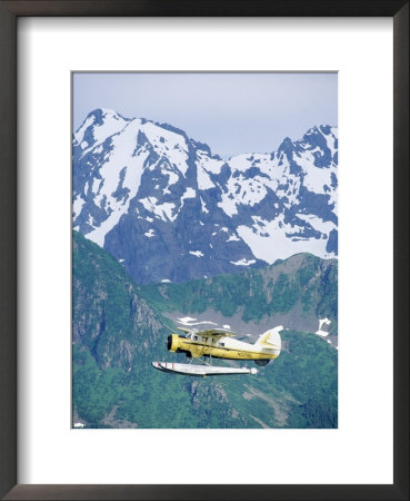 Seaplane In Flight Near Mountains, Ak by Jim Oltersdorf Pricing Limited Edition Print image