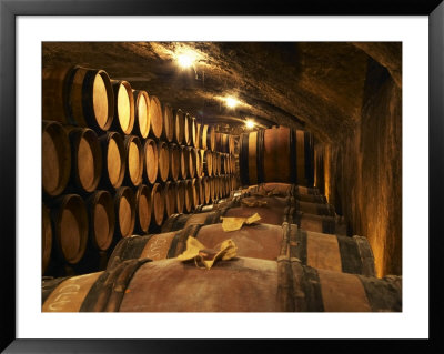 Wooden Barrels With Aging Wine In Cellar, Domaine E Guigal, Ampuis, Cote Rotie, Rhone, France by Per Karlsson Pricing Limited Edition Print image