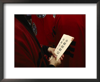 Buddhist Priest Holds Prayer Cards In His Hands by Eightfish Pricing Limited Edition Print image