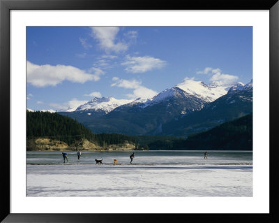 Hockey On Frozen Green Lake In Whistler, British Columbia, Canada by Taylor S. Kennedy Pricing Limited Edition Print image
