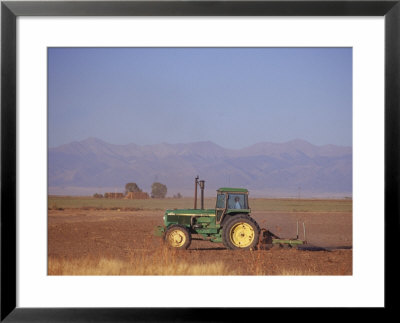 Farmer In Tractor, San Luis Valley, Co by Gary Conner Pricing Limited Edition Print image