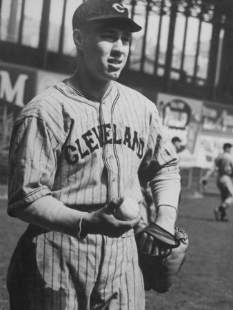 Cleveland Indians Star Pitcher Bob Feller Warming Up During Game by Carl Mydans Pricing Limited Edition Print image
