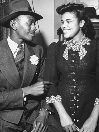 Baseball Player Satchel Paige, Rubbing His Wife's Arm by George Strock Pricing Limited Edition Print image