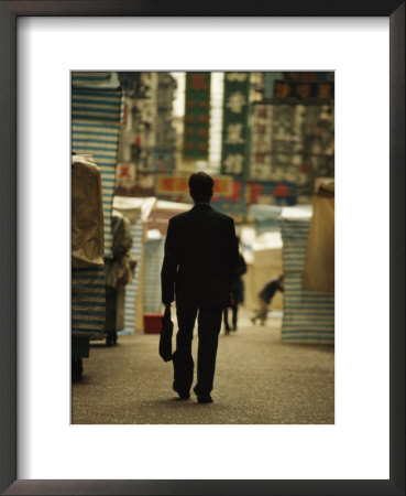 Office Worker With A Briefcase Walks Down A Kowloon Street by Eightfish Pricing Limited Edition Print image