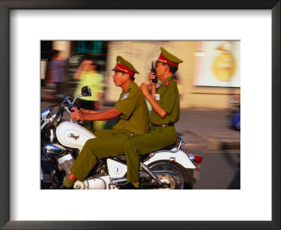 Policemen On Motorbike, Ho Chi Minh City, Vietnam by John Banagan Pricing Limited Edition Print image