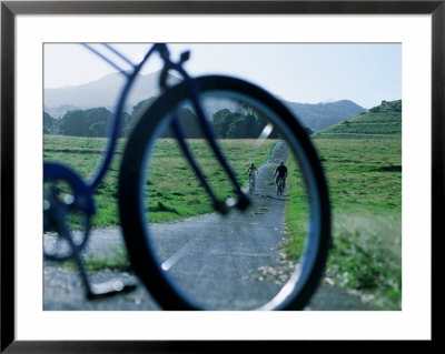Cyclists Seen Through Bicycle, Hana, Usa by Holger Leue Pricing Limited Edition Print image