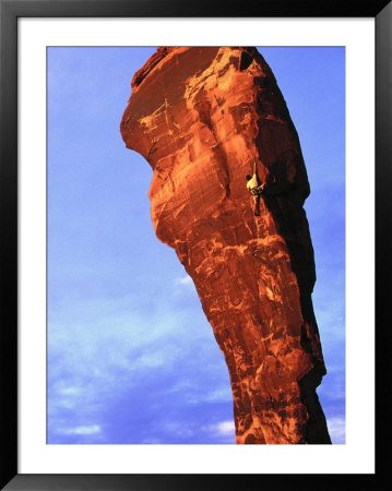 Man Rock Climbing, Canyonlands, Ut by Greg Epperson Pricing Limited Edition Print image
