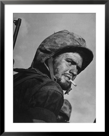 Battle Weary, Cigarette Smoking Marine On Saipan During Fight To Wrest The Island From Japanese by W. Eugene Smith Pricing Limited Edition Print image