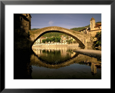 Il Ponte Vecchio And Nervia River Reflection, Riviera Di Ponente, Dolceacqua, Liguria, Italy by Walter Bibikow Pricing Limited Edition Print image