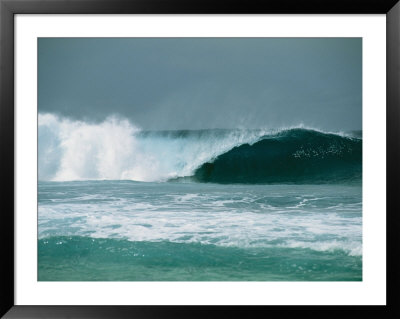 Giant Rolling Wave Breaking As It Approaches A South Pacific Beach by Todd Gipstein Pricing Limited Edition Print image