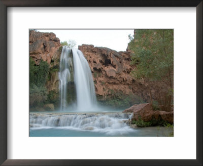 Deep Blue Water Rushes Over A Cliff Formed By Mineral Deposits by Taylor S. Kennedy Pricing Limited Edition Print image
