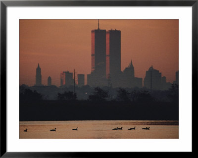 Ducks Pass In The Shadow Of The New York Skyline by Melissa Farlow Pricing Limited Edition Print image