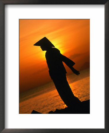 Silhouette Of Woman Exercising On Beach At Sunset, Nha Trang, Khanh Hoa, Vietnam by John Banagan Pricing Limited Edition Print image