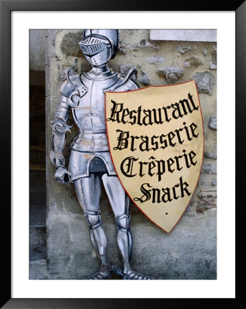 Knight In Armour Restaurant Sign In Medieval Walled City, Carcassonne, France by Dallas Stribley Pricing Limited Edition Print image