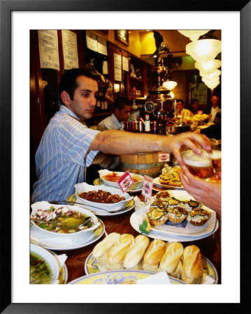 Pinxtos (Tapas) On Counter Of Busy Ormazabal Taberna Bar, San Sebastian, Spain by Dallas Stribley Pricing Limited Edition Print image