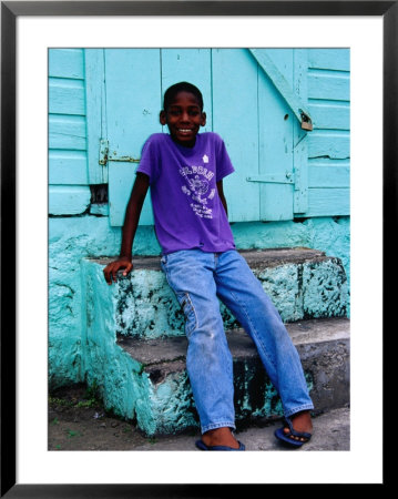 Portrait Of Young Boy On Steps, Basseterre, St. Kitts & Nevis by Richard Cummins Pricing Limited Edition Print image