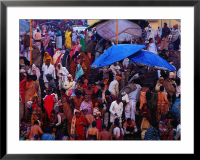 Hindu Pilgrims Bathe In Sacred Ganges River At Dasaswamedh Ghat, Varanasi, Uttar Pradesh, India by Richard I'anson Pricing Limited Edition Print image