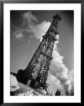 Creditul Minier Oil Well Watched Over By Armed Guards 17 Kilometers From Ploesti In A Oil Field by Margaret Bourke-White Pricing Limited Edition Print image