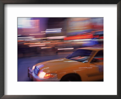 Blurred View Of Taxi Cab In Times Square, Nyc by Rudi Von Briel Pricing Limited Edition Print image