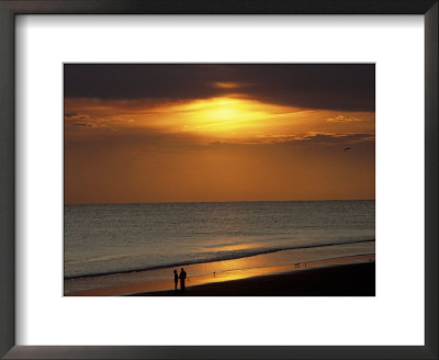 Couple Along Shore With Sunset by Chip Henderson Pricing Limited Edition Print image