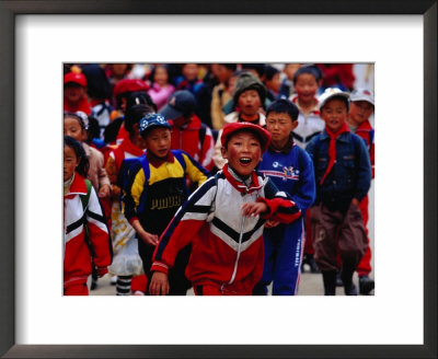 Group Of School Children On Main Street Of Daocheng, China by Richard I'anson Pricing Limited Edition Print image