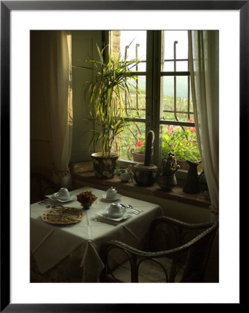 Table Is Set For Breakfast Near A Window Looking Out On Tuscan Hills, Tuscany, Italy by Todd Gipstein Pricing Limited Edition Print image
