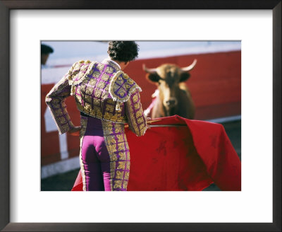 Bullfighter Holds His Red Cape Before A Bull by Pablo Corral Vega Pricing Limited Edition Print image