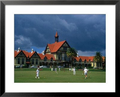 Playing Croquet In Front Of Former Bath House, Now Museum Of Art And History, Rotorua, New Zealand by Krzysztof Dydynski Pricing Limited Edition Print image