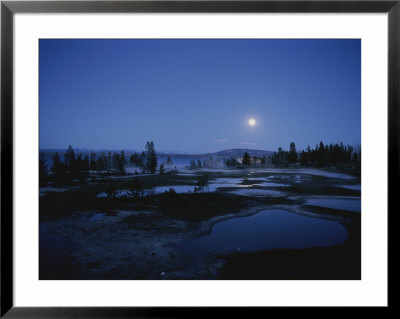 Full Moon Shines On The Geyser Basin Of West Thumb by Norbert Rosing Pricing Limited Edition Print image