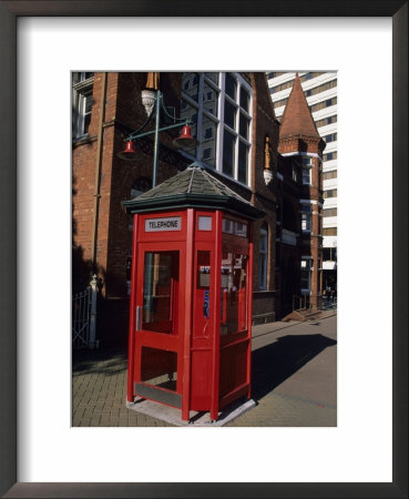 A Red Phone Booth And Victorian Architecture by Rich Reid Pricing Limited Edition Print image