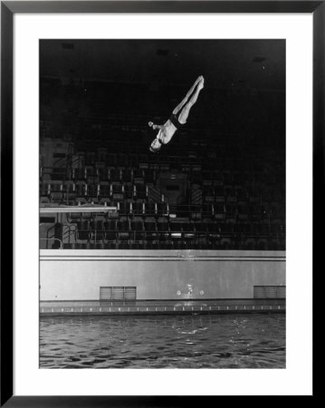 Double Twister Dive By Ohio State University Diver Miller Anderson, Ncaa Swimmer Of The Year by Gjon Mili Pricing Limited Edition Print image