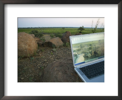 Laptop Computer In The Veld, Northern Tuli Game Reserve, Botswana by Roger De La Harpe Pricing Limited Edition Print image