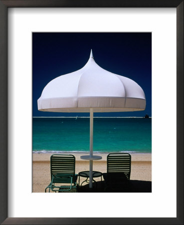 Chairs And Umbrella At Jumeirah Beach, Ritz Carlton Hotel, Dubai, United Arab Emirates by Izzet Keribar Pricing Limited Edition Print image