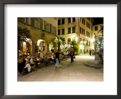 People Sitting At Outdoor Cafes And Restaurants, Stuttgart, Germany by Yadid Levy Pricing Limited Edition Print image