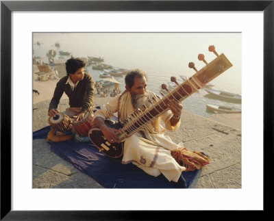 Musicians Playing The Sitar And Tabla On The Banks Of The River Ganges, Varanasi, India by John Henry Claude Wilson Pricing Limited Edition Print image