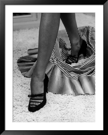 Artful Shot Of Model Showing Off A Pair Of High Heel Shoes by Nina Leen Pricing Limited Edition Print image
