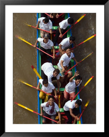 Cambodian Racers Row Their Wooden Boat Upon A Water Festival by Heng Sinith Pricing Limited Edition Print image