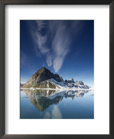 Clouds And Jagged Mountains Are Reflected In Hornsund Fjord by Ralph Lee Hopkins Pricing Limited Edition Print image
