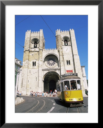 Electrico (Electric Tram) In Front Of The Se Cathedral, Lisbon, Portugal by Yadid Levy Pricing Limited Edition Print image