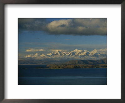 A View Of Lake Titicaca Across To The Snow-Capped Andes Mountains by Kenneth Garrett Pricing Limited Edition Print image