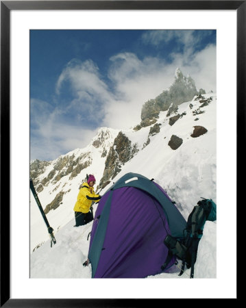 A Hiker Sets Up A Tent On A Snowy Ledge On Mount Hood by Dugald Bremner Pricing Limited Edition Print image
