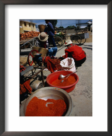 Women From Small Patou Island Grind Chilies To Powder, Dali, Yunnan, China by Diana Mayfield Pricing Limited Edition Print image