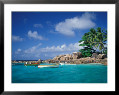 Boats And Tropical Beach On St. Pierre Islet, Seychelles by Nik Wheeler Pricing Limited Edition Print image