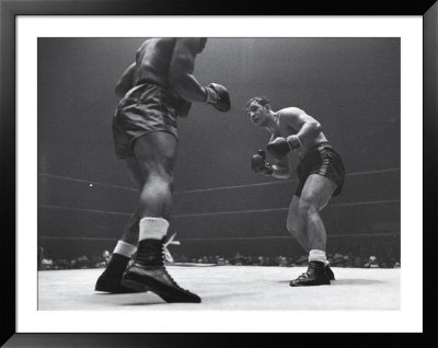 Blood Flowing From Rocky Marciano's Eye After Simmons Rocks Him In The 2Nd Round With Hard Right by Eliot Elisofon Pricing Limited Edition Print image
