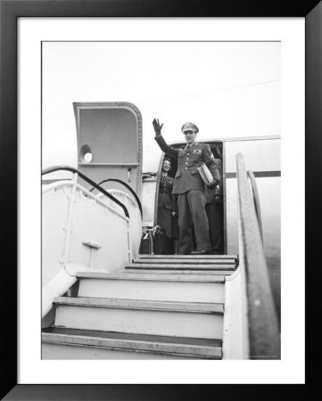 Elvis Presley On Stairway Of Airplane Waving, Prepares To Return Home After Army Tour Of Duty by James Whitmore Pricing Limited Edition Print image